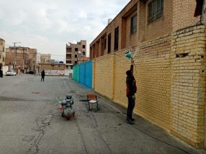اجرای رنگ آمیزی دیوارهای مدرسه شهید سردار سلیمانی