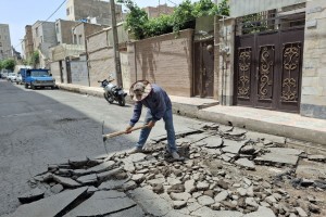 اجرای عملیات زیرسازی آسفالت گذر بهارستان نهم