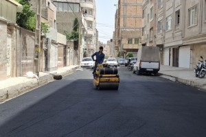  اجرای عملیات زیرسازی و آسفالت کوچه بهارستان نهم