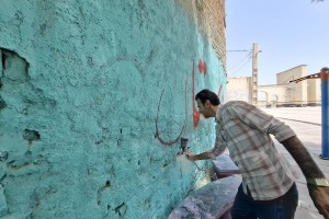 اجرای طرح رنگ‌آمیزی و دیوارنویسی به منظور زیباسازی فضاهای عمومی شهر