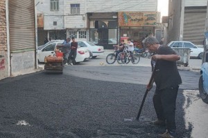 اجرای عملیات لکه‌گیری و ترمیم آسفالت کوچه بوستان هشتم  