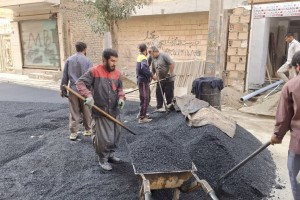 ترمیم سطح آسفالت کوچه والفجر 7 شرقی در راستای ارتقای کیفیت عبور و مرور