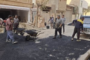 ترمیم سطح آسفالت کوچه والفجر 7 شرقی در راستای ارتقای کیفیت عبور و مرور